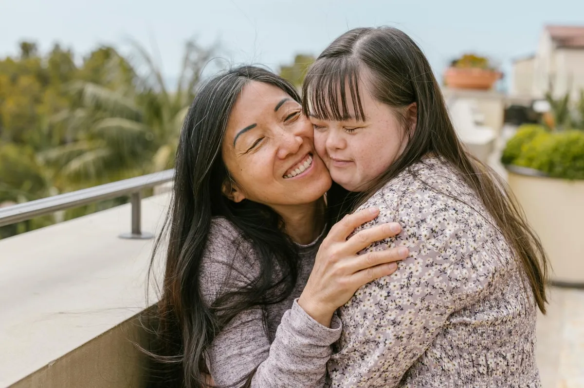 A mother embracing her daughter, DODD-certified I/DD advocacy and integrated care in Cincinnati